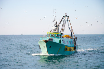 fishing boat returns home