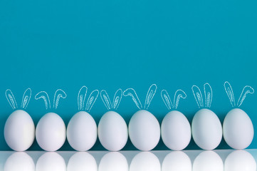 Obraz premium White eggs with Easter Bunny ears
