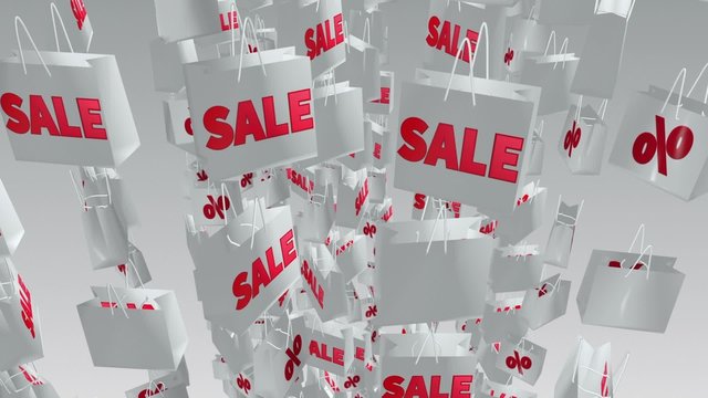 White shopping bags with sale and percent inscription