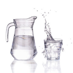 Fresh water glass with splash and bottle isolated - 80811856