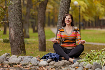 The woman in autumn park