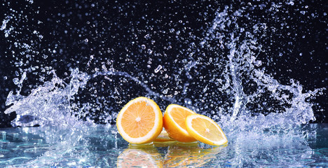 Macro water splash on lemon. Water drops with juicy lemon