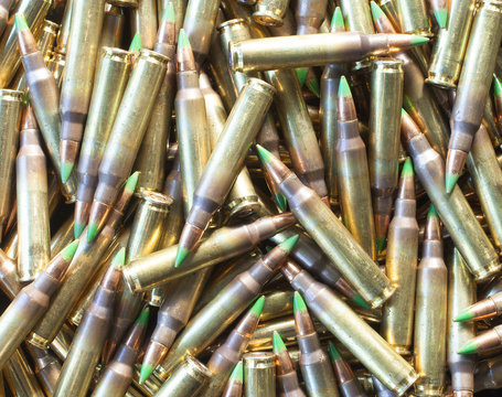 rifle ammo with green tip bullets