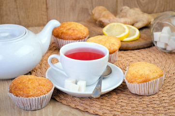 sweet muffins on wooden table