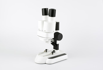 White microscope isolated on white background