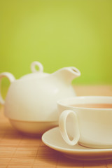 white cup of tea
