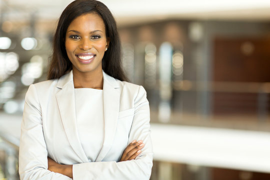black business executive with arms crossed