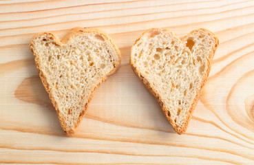 Couple of slices of bread in the form of hearts