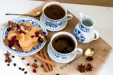 Coffee with sweets. White-blue porcelain.