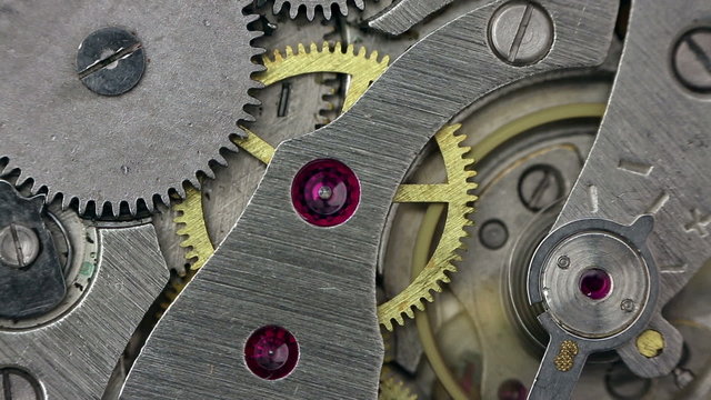Clockwork of an old mechanical clock close up