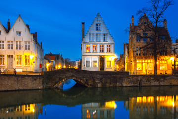 Night Bruges canal with beautiful colored houses