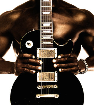 African American Shirtless Man Holding Electric Guitar