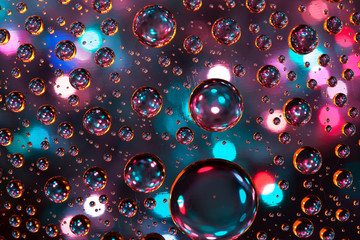 Abstract background texture drops of water and art light on glas