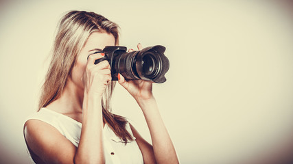 Photographer girl shooting images