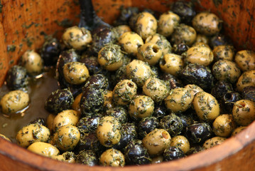 Olives in wooden barrel