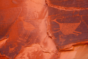 Ancient Anasazi petroglyphs in Monument Valley tribal park