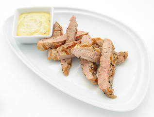 Grilled pork with mayonaisse studio shot