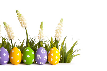 Easter Eggs with flower on Fresh Green Grass