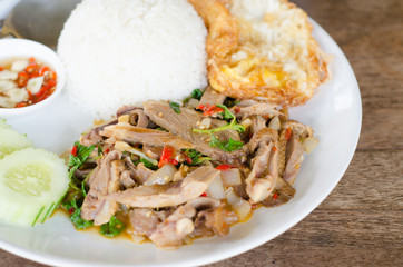 Stir fried duck with holy basil