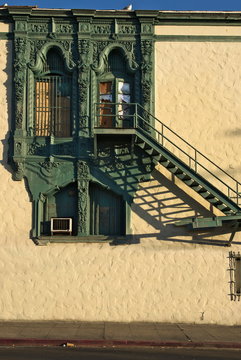 Ornate vintage fire escape and window frame