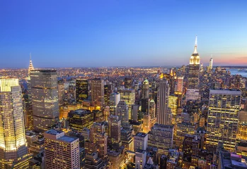 Selbstklebende Fototapeten New York City Manhattan buildings skyline evening © blvdone