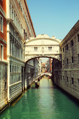 Venice. Gondolas passing over Bridge of Sighs