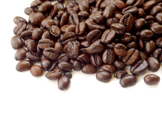 Brown coffee beans isolated on white background