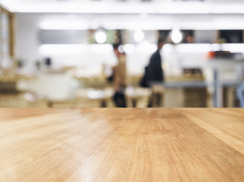 Table top with People and blurred kitchen background