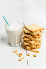 Glass of milk with cookie