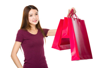 Shopping woman happy smiling holding shopping bag