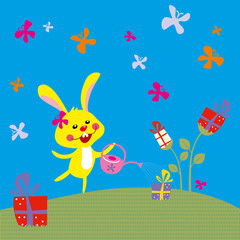 Obraz na płótnie Canvas funny bunny with a gift