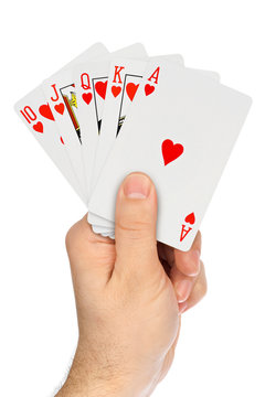 Hand with playing cards