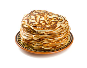 stack of crepes on a plate isolated on white