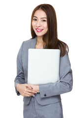 Young asian businesswoman hold with notebook computer