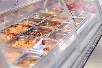 Cafeteria take-out food in showcase window