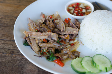 Stir fried duck with holy basil