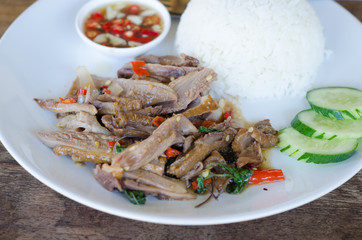 Stir fried duck with holy basil