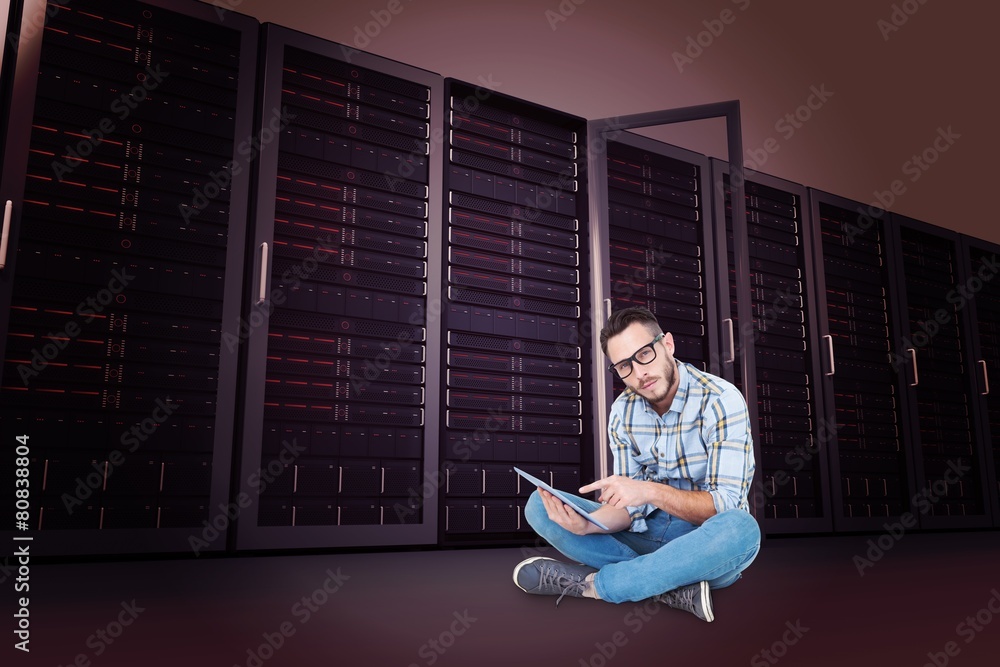 Poster Composite image of handsome hipster using tablet pc