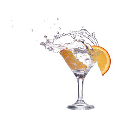 Orange or lemon slice fall in glass with water and make splash