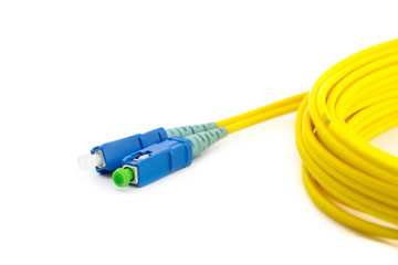 Hank of yellow optic cable with blue patch cord connectors