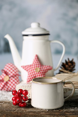 Winter composition with hot beverage on nature background