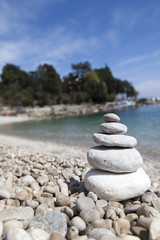 Stack of stones, Zen concept, on sandy beach