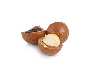 Shelled and unshelled macadamia nuts isolated on white