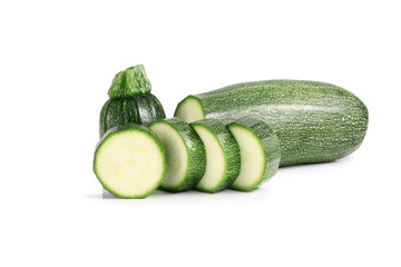 sliced and whole cucumber isolated on white background