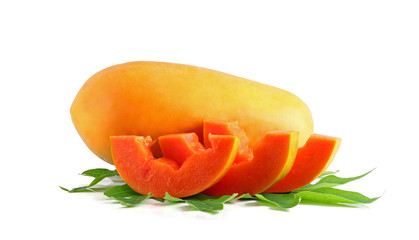 sweet papaya on the dish with green papaya leaf