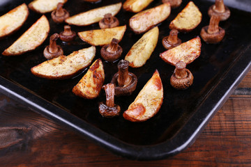 Baked potatoes with mushrooms and spices