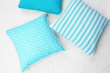 Decorative pillows on plaid close up