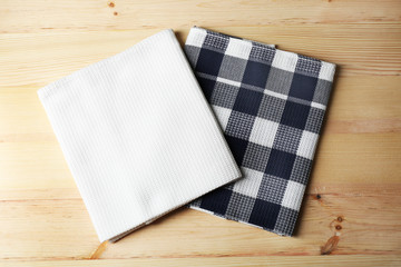 Kitchen towels on wooden background