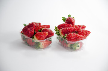 stil life of organic strawberries grouped