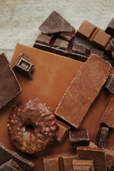 Set of chocolate on wooden table, closeup